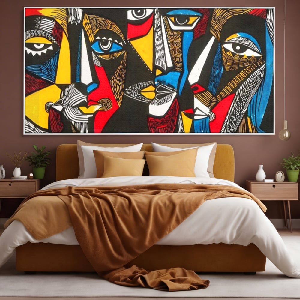 Tablou canvas cu tablou abstract cu fete colorate, in rama de aluminiu argintiu, pe perete intr-un dormitor